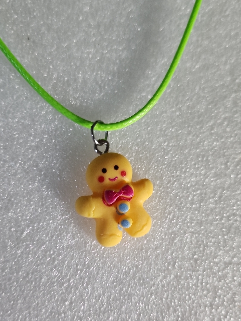 Hand Crafted Yellow Gingerbread Man Necklace with Pink Bow